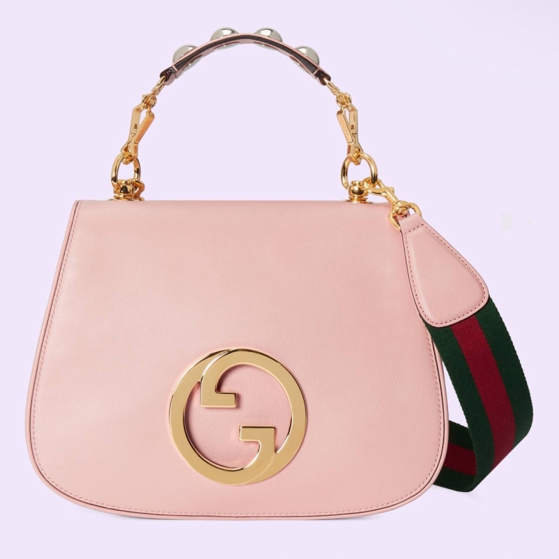 G*u*i top handle bags